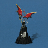 Glass dragon holding orb with red and black wings on black mountain with pewter castle