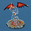 Glass dragon figurine with black and red wings, gold accents, holding crystal ball on a mirror base with fiery colored designs