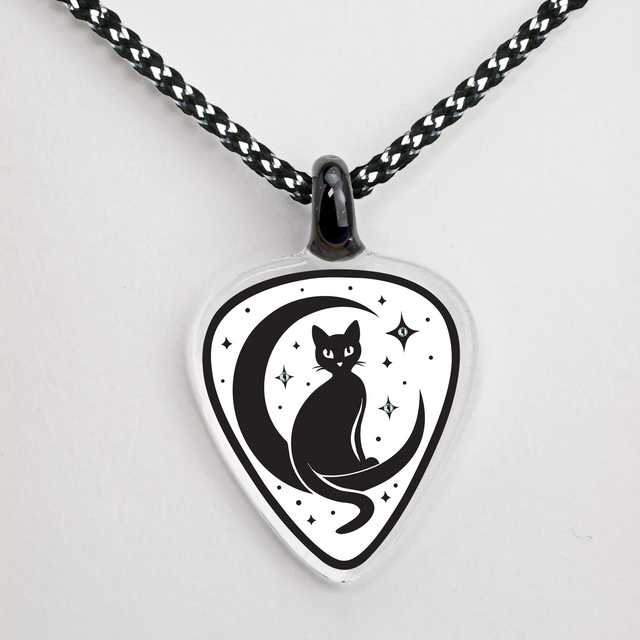 Guitar pick-shaped pendant with a black cat design on a white background