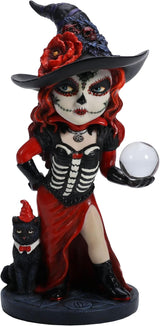 Figurine of witch in red and black with cat and crystal ball, Day of the Dead face paint