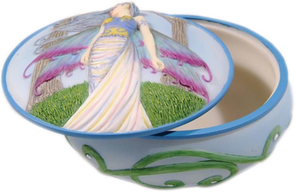 Trinket Box with fairy on the front standing between trees
