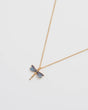 Gold necklace with a dragonfly pendant