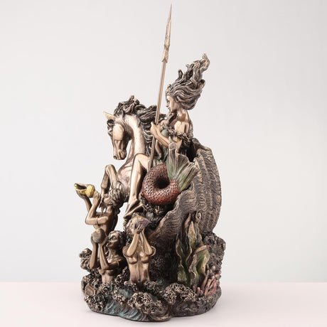 Figurine in bronze tones of Amphitrite the goddess of the sea, riding hippocampus with ocean waves and sirens, holding baby