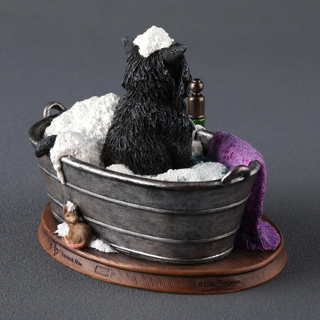 Figurine by Lisa Parker, black and white cat in bubble bath tub with soap bottles, purple towel, mouse at the back