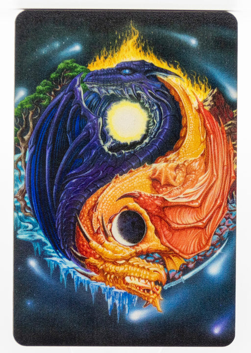 Magnet with blue-black and orange dragons forming a yin yang shape