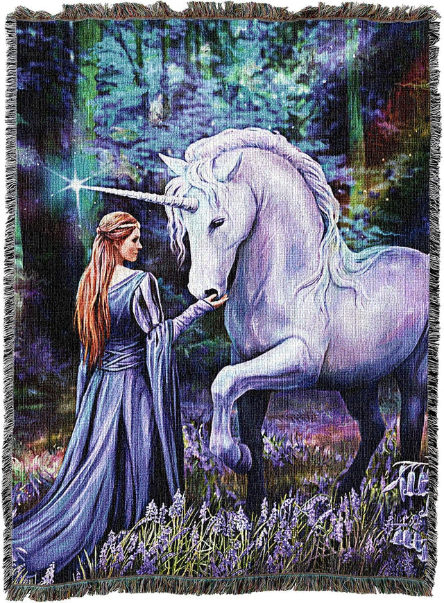 Tapestry blanket with unicorn and maiden in bluebell-filled forest meadow