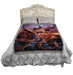 Fire dragon blanket shown on a bed