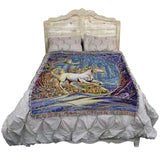 Bed with a tapestry featuring unicorn and magic forest