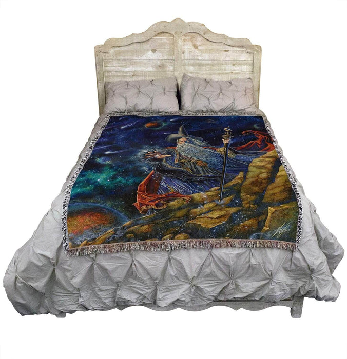 Wizard tapestry blanket show on a bed