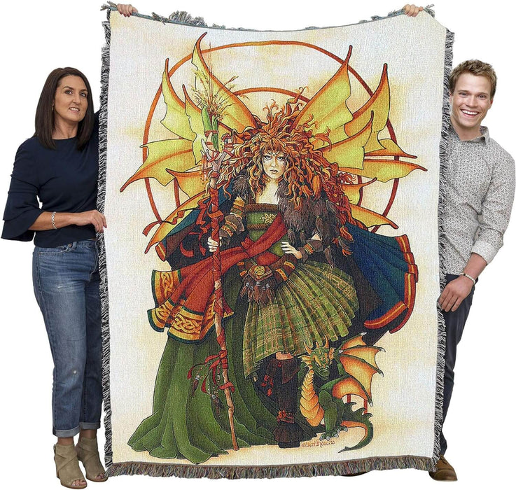 Tapestry blanket held by adults to show large size