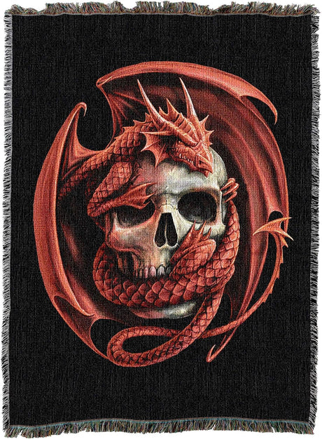 Tapestry blanket, red dragon curled around a skull on black background