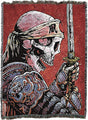 Woven blanket with a design of a skeleton in armor holding a sword on a red background