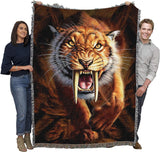 Tapestry blanket held by adults to show large size
