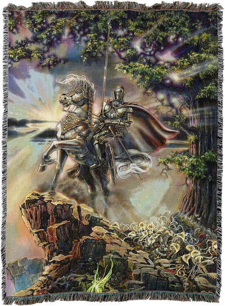 Tapestry blanket by Myles Pinkney, knight in shining armor on horse standing on cliff with sun behind
