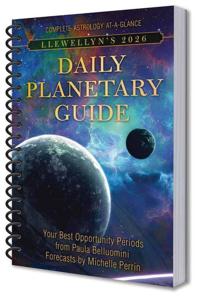 Spiral-bound book titled 'Llewellyn's 2026 Daily Planetary Guide' with celestial design on cover