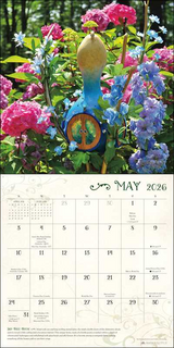 Calendar page for May 2026 with a colorful fairy house and flowers