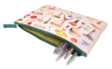 Pencil case with colorful mushroom design and pens peeking out on a white background