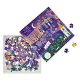 Jigsaw puzzle with colorful fairy tale picture, showing pieces in box
