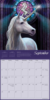 Calendar page with a unicorn and stained glass window design, featuring the month of September.