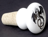 Bottle stopper with black wyvern dragon on white background and cork