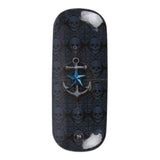 Back of glasses case, nautical anchor design against skull backdrop