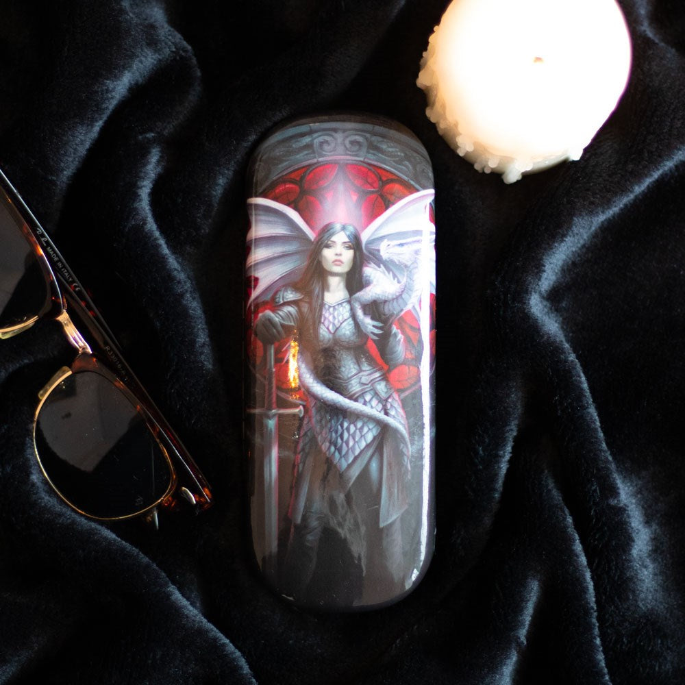 Glasses case with woman in armor holding sword, dragon on her shoulder.