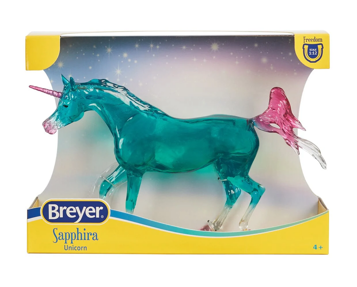 Model unicorn with clearware aqua body, white socks and tail tip, pink hooves, tail, mane, nose and horn, shown in box - Sapphira
