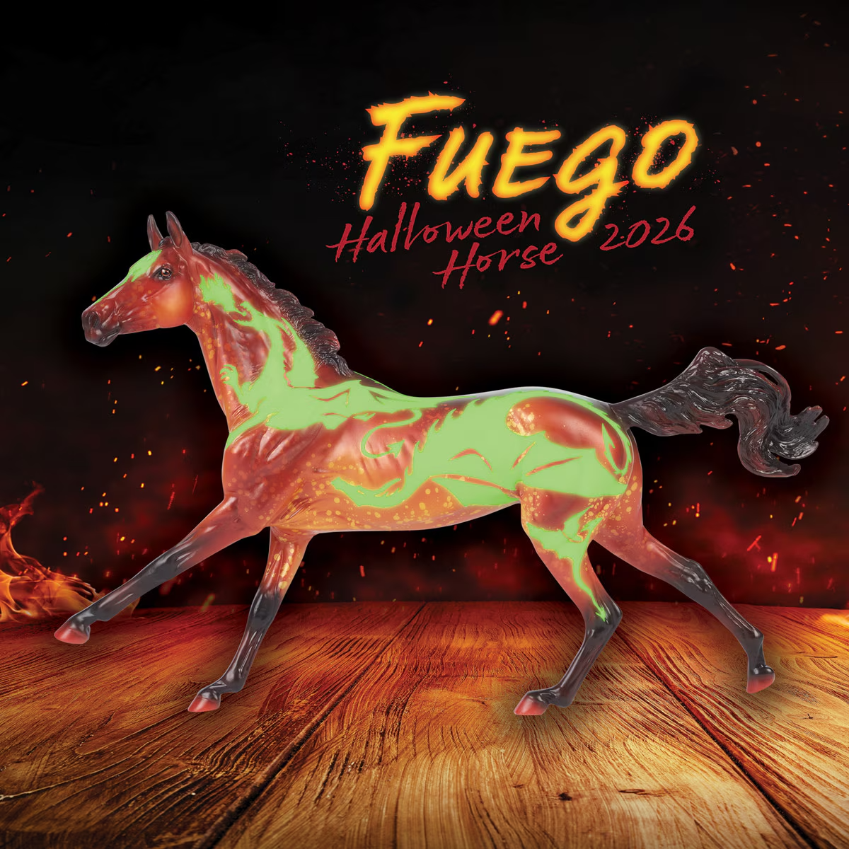Breyer model horse, fiery orange-red with darker mane, tail & legs, with glow in the dark dragon design