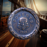 Copper coin with "Roberts 1721" and pirate skull