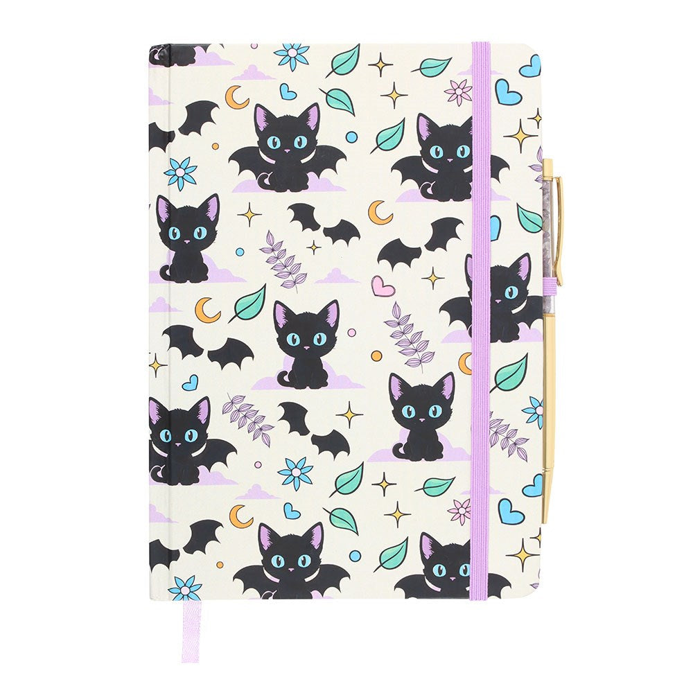 Notebook with black cat and bat pattern and pen