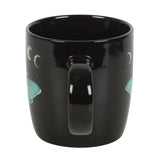 Handle of black ceramic mug