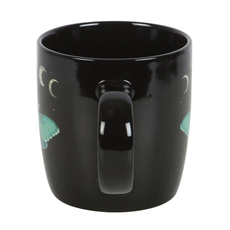 Handle of black ceramic mug