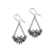 Luna moth-shaped earrings with chain details on a white background