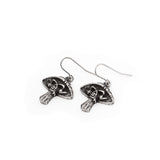 Pewter mushroom skull earrings on a white background