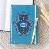 Blue journal with Hand of Hamsa protection design and all seeing eye, and gold crystal-chip filled pen