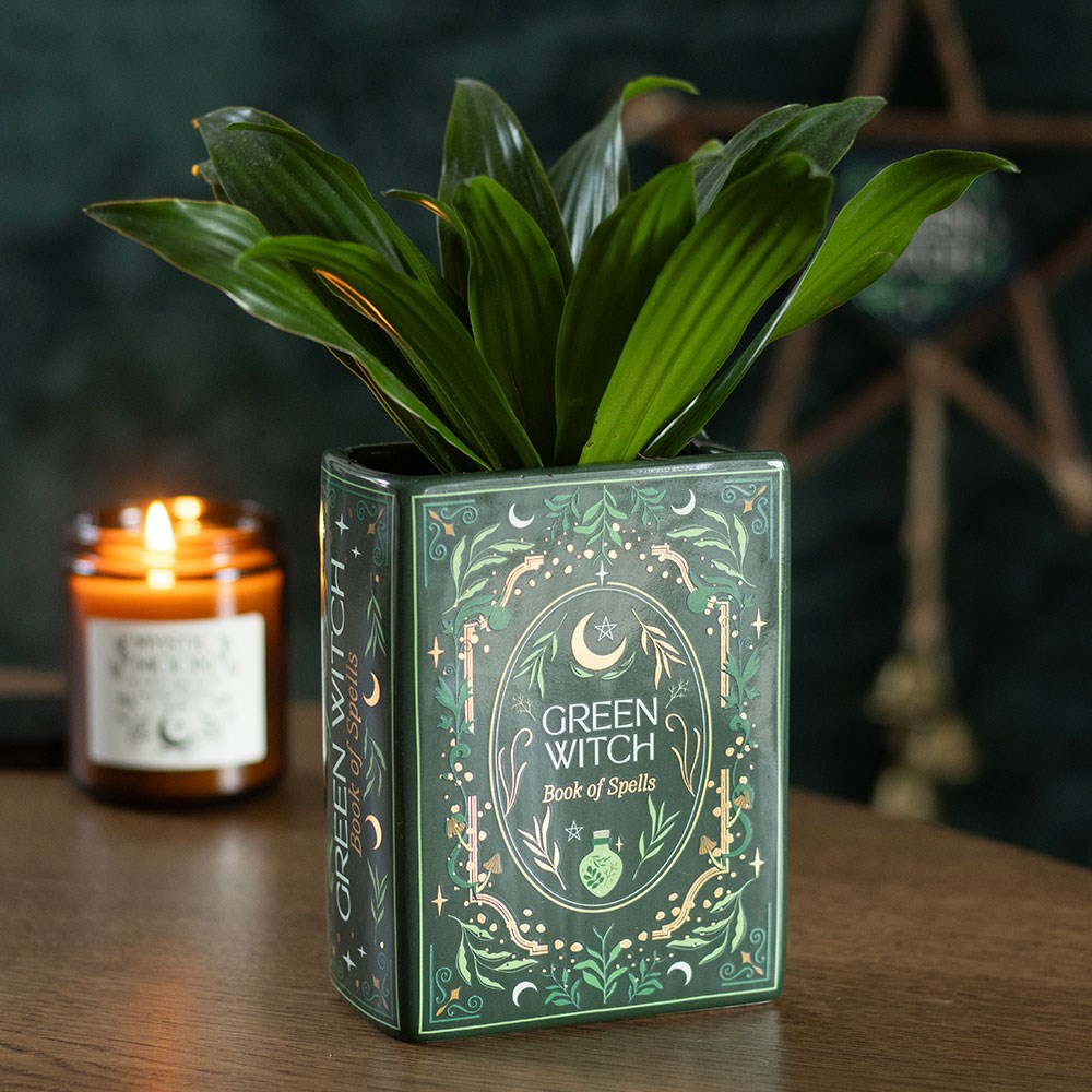 Ceramic vase shaped like a book with Green Witch - Book of Spells and floral accents