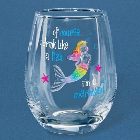 Stemless wineglass with rainbow mermaid, text reads "of course i drink like a fish i'm a mermaid"