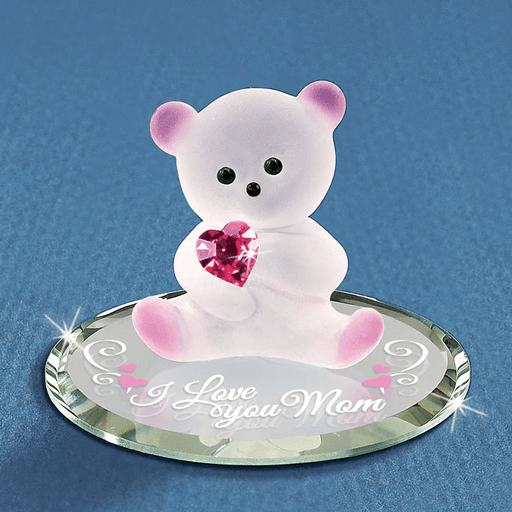 Figurine of frosted white and pink glass bear holding crystal pink heart on a mirrored base that says "I Love You Mom"