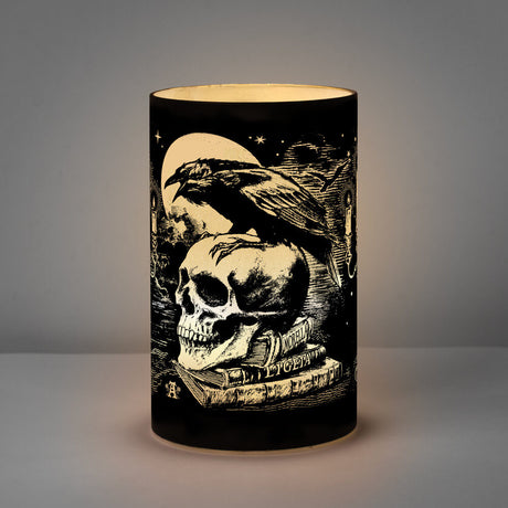 LED Lantern light with black etched glass showing a raven sitting on a skull on a bookstack, full moon in the background