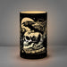 LED Lantern light with black etched glass showing a raven sitting on a skull on a bookstack, full moon in the background