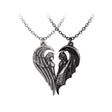 Pair of angel and demon pendants forming a heart shape 