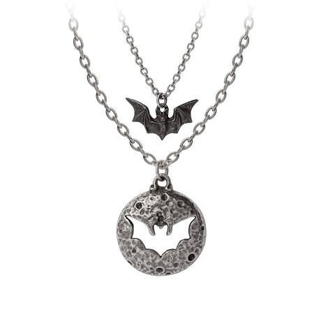 Two necklaces in pewter that fit together, one is a full moon with a cutout and the other a darker bat