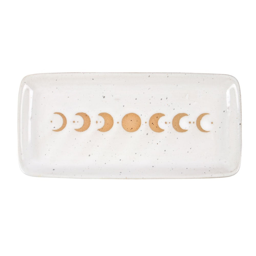 Rectangular ceramic dish with moon phase design on a white background