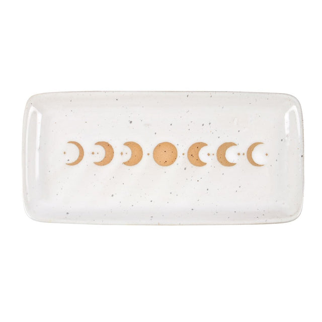 Rectangular ceramic dish with moon phase design on a white background