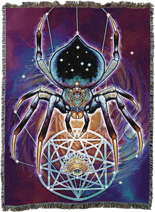 Tapestry blanket of a spider weaving a web with an eye at the center. 