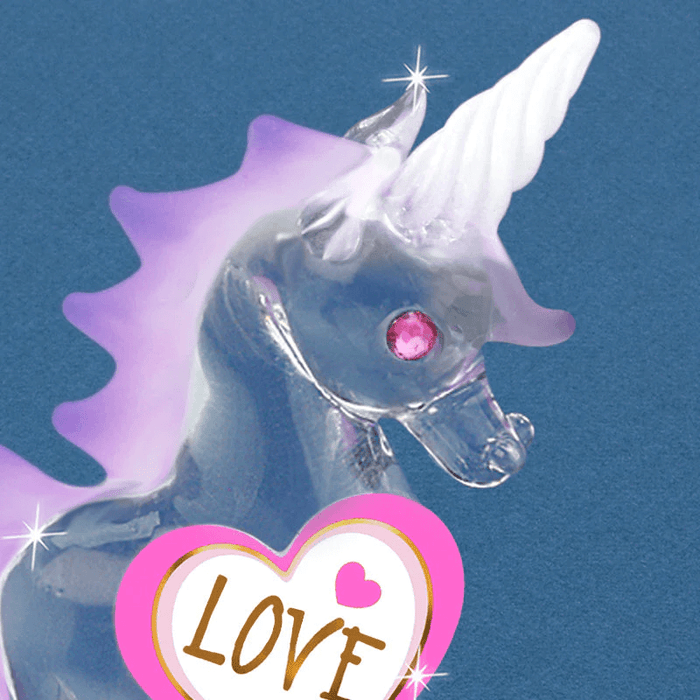 Closeup of unicorn's face with crystal eyes (pink), frosted white horn and purple mane