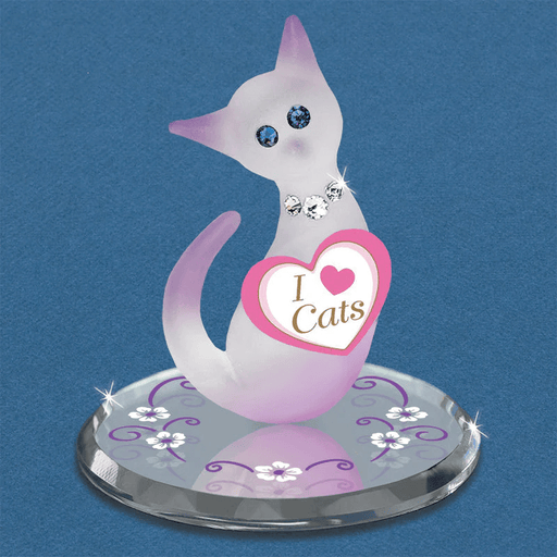 Figurine of a frosted white and pink glass cat with "I Love Cats" tag and crystal eyes and collar on a  mirror base decorated with flowers