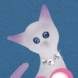 Closeup of glass cat's face with blue crystal eyes and white crystal collar