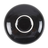 Back of black ceramic trinket dish