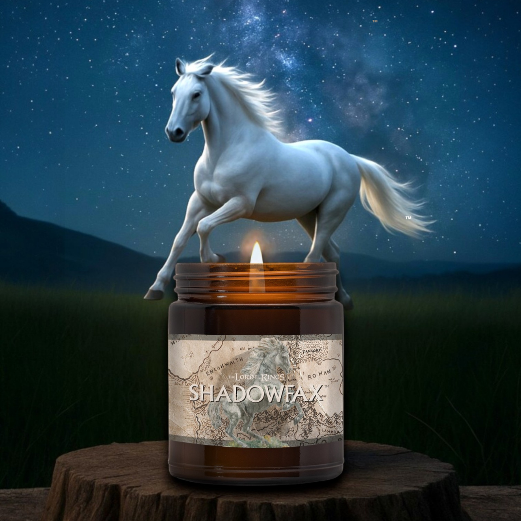 Candle labeled 'Shadowfax' with a white horse on top against a starry night sky